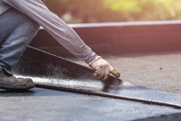 Professional Exterior Waterproofing technician working in Islip Terrace, NY